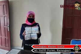 PEMBAGIAN MASKER GRATIS KEPADA MI YAPPI PURWO